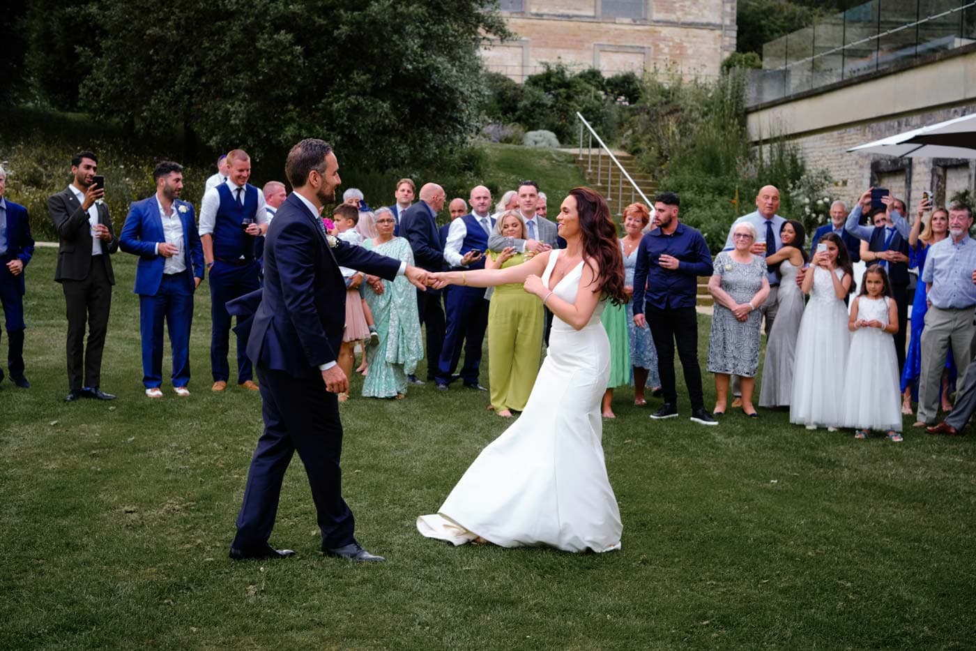 Bride and Groom dancing on Compton Verney lawn